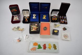 An interesting collection of Robertsons Jam advertising figures to include Farewell badges, World