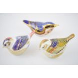 Three Royal Crown Derby bird paperweights, Goldcrest, date code for 2005 (MMV), gold stopper,