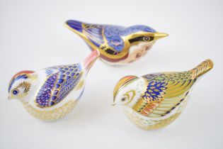 Three Royal Crown Derby bird paperweights, Goldcrest, date code for 2005 (MMV), gold stopper,