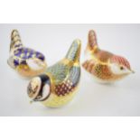 Three Royal Crown Derby bird paperweights, Wren, date code for 1989 (LII), gold stopper, Blue Tit,