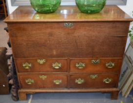 Georgian / early Victorian oak mule chest, the lifting lid above four drawers, on bracket feet, with