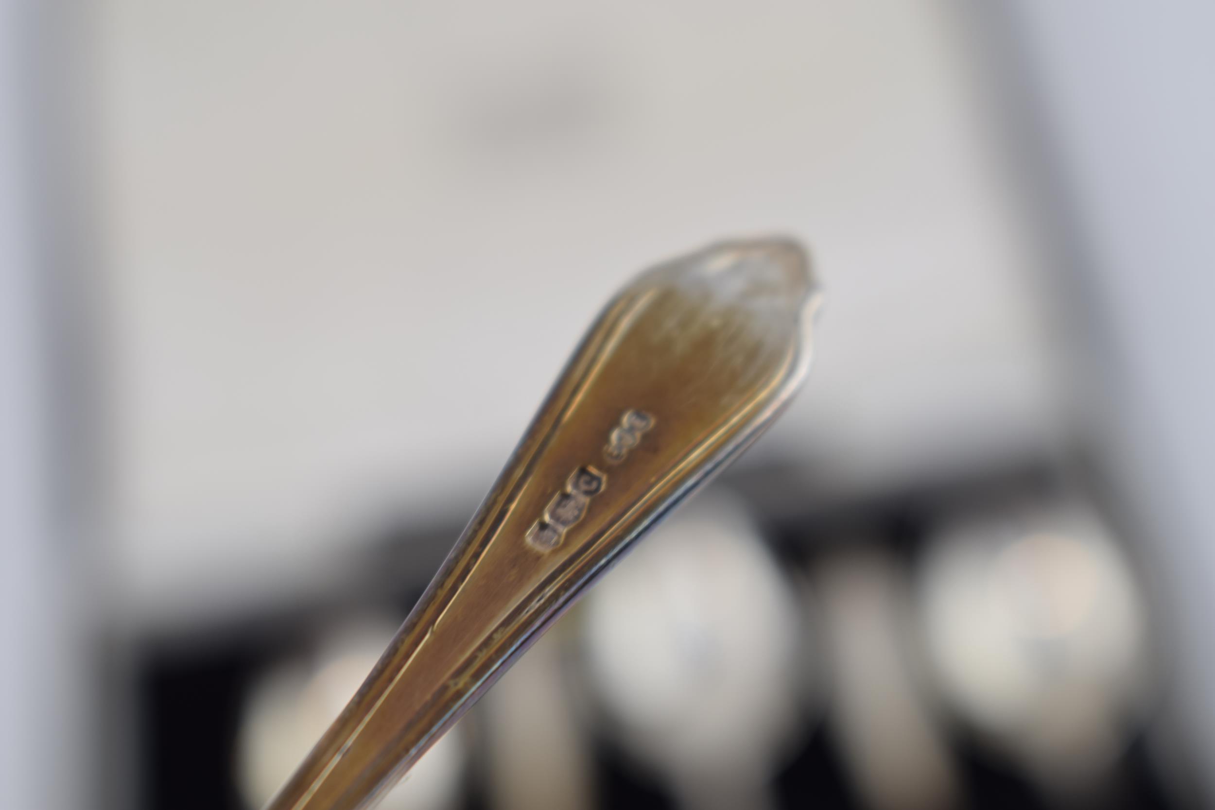 A set of silver spoons hallmarked Sheffield 1945. In original retailers box, T.S Nedham & Murphy, - Image 2 of 2