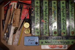 A collection of vintage art supplies to include paint brushes, rulers and various other similar
