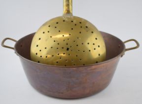 A 19th century brass and copper bed warmer (length 101cm) together with a copper jam pan. (