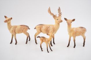Beswick deers to include a stag, 2 does and a fawn (4). In good condition with no obvious damage