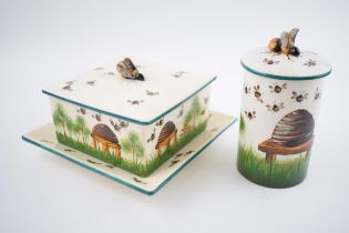 Wemyss Griselda Hill Pottery honey box and cover , together with a elongated honey jar, decorated
