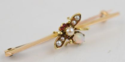 Victorian 15ct gold brooch with a dragonfly set with a ruby, pearls and an opal stone, 2.4 grams,