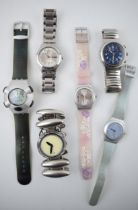 A collection of Swatch watches to include stainless steel chronometer and date models together