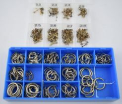 A collection of vintage NOS pocket watch bows and hands. (40+) All in original condition With lots
