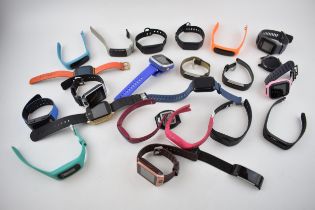 A collection of over 20 fitness watches of note Garmin and TomTom examples. (20) All in original