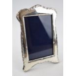 Hallmarked silver photo frame with easel back, 20cm tall, London 2019.