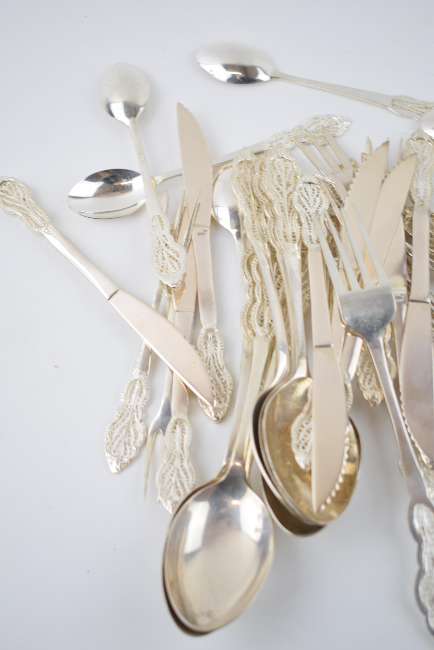 A good collection of silver 830 cutlery with an ornate filigree design, hallmarked 830 with - Image 6 of 8