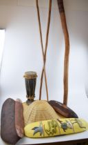 A collection of interesting items of tribal / aborigini origins, to include sticks / spears, shields