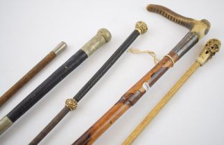 A collection of antique riding crops. Of note an example by Swaine & Isaac, London a/f, together