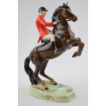 Beswick rearing huntsman on brown horse 868. In good condition with no obvious damage or