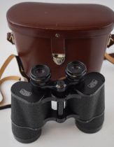 A pair of Carl Zeiss Jena binoculars, JENOPTEM 10 x 50 W, In good original condition with original