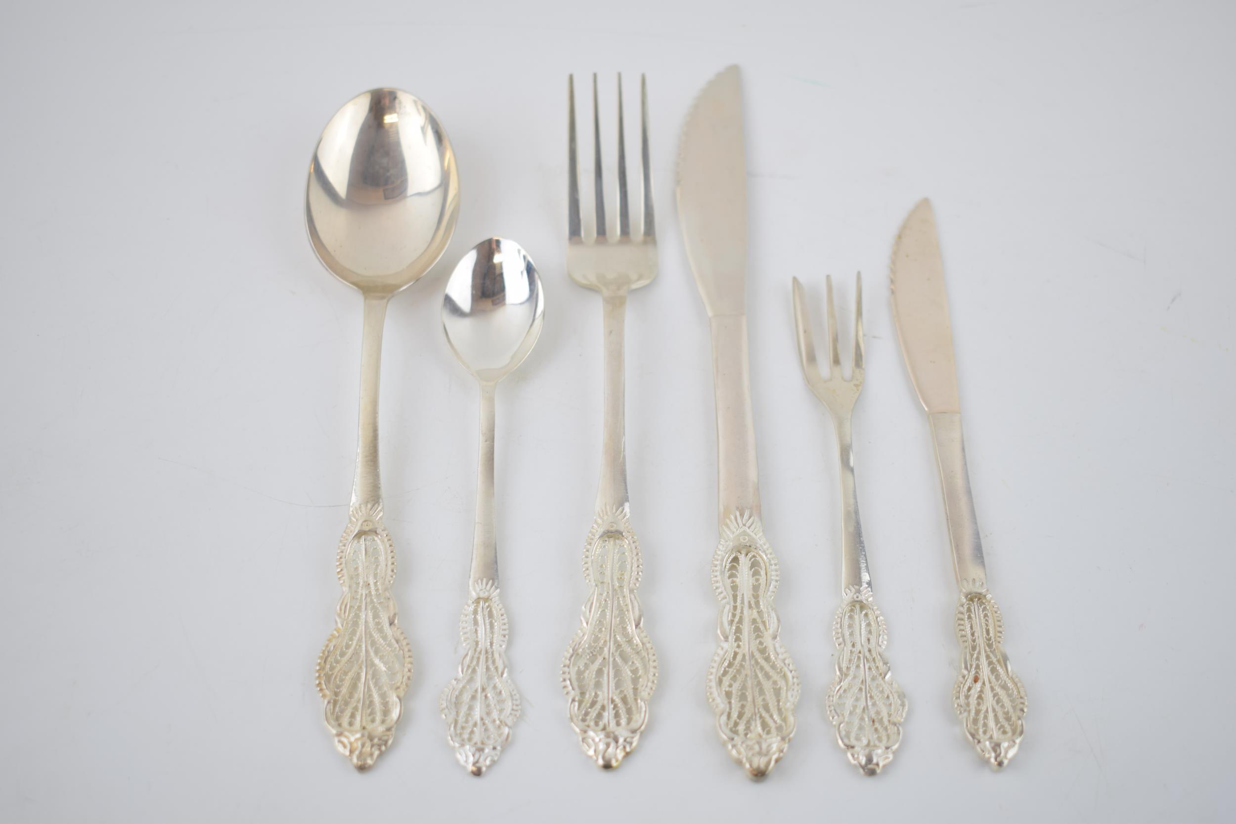 A good collection of silver 830 cutlery with an ornate filigree design, hallmarked 830 with - Image 7 of 8