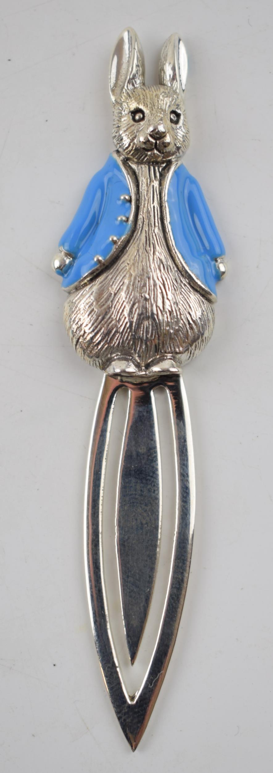 Sterling silver bookmark in the form of Peter Rabbit, with blue enamel jacket, 7.7 grams, 7.5cm