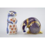 Royal Crown Derby paperweights to include a badger and a chipmunk, both with gold stoppers (2). In
