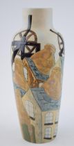 Burslem Pottery high shouldered vase with a potteries mining scene, 25cm tall. In good condition
