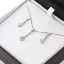 9ct white gold jewellery set to include a pair of earrings with a pendant and chain, all diamond