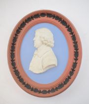 Wegdwood Jasperware oval plaque, in four colours, depicting Josiah Wedgwood, 13.5cm tall. In good