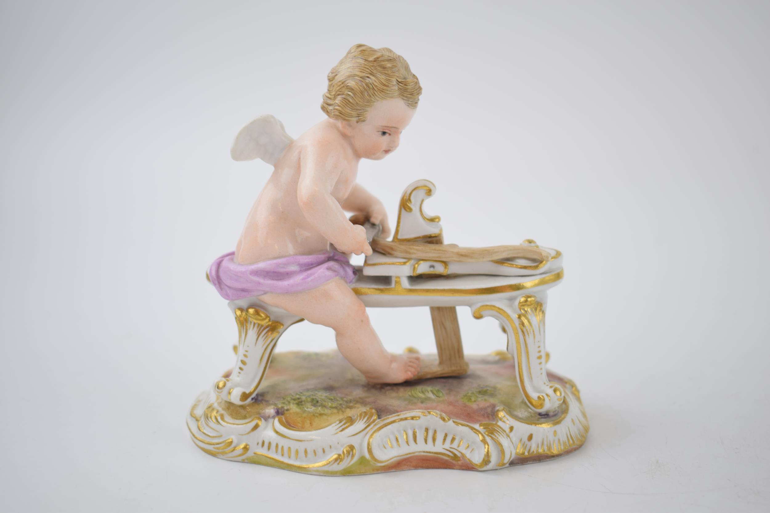 Early 20th century Meissen figure 'Cupid Carving His Bow', 11cm wide, with incised marks, together - Image 2 of 7