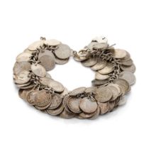 Sterling silver bracelet with many silver three pence pieces to include pre-1946 and pre-1920