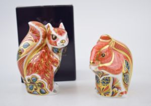 Two Royal Crown Derby paperweights, Woodland Squirrel, 10cm high, gold stopper and red printed marks