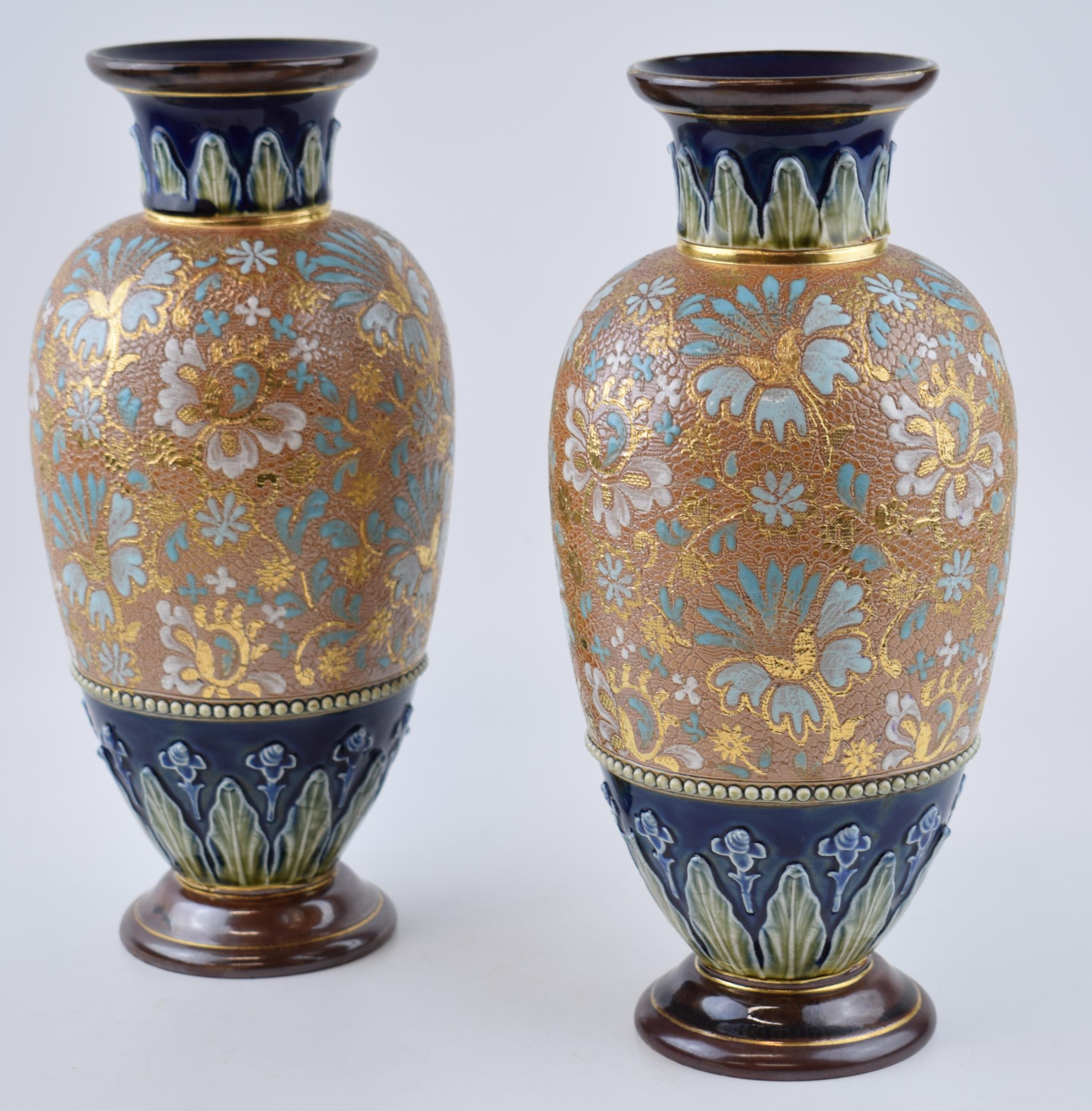 A pair of Doulton Lambeth & Slaters patent stoneware vases, with floral decoration, artists