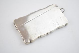 Silver card case with musical engraving, 50.0 grams, Birmingham 1913.