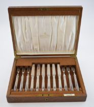 A set of silver plated Mappin & Webb fruit set with 6 forks and 6 knives, boxed with key.