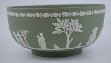 Wedgwood Jasperware in green pedestal bowl, 20.5cm diameter. In good condition, some surface wear.