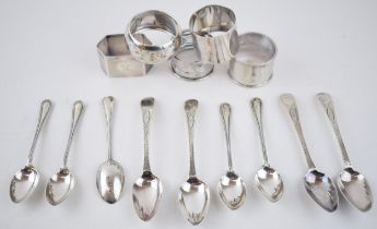 A collection of sterling silver items to include 5 singular napkin rings with tea spoons, combined