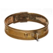 An antique brass dog collar with ball decoration and sliding buckle. Diameter 46cm. In good original