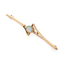 15ct gold bar brooch set with central opal, 3.8 grams, 64mm.