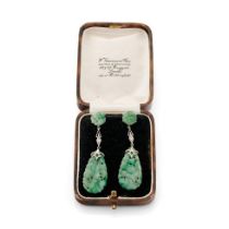 18ct gold Art Deco earrings with carved jade decoration, each set with a diamond, in period box, 5.