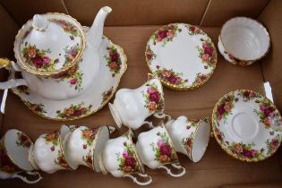 Royal Albert Old Country Roses to include a teapot, 6 trios, a sugar bowl, a cake plate and a milk