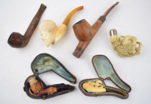 Smoking Interest: a collection of smoking pipes to include a cased meerschaum example, another