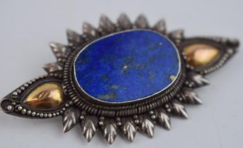 Antique silver brooch with lapis lazuli stone and yellow metal fronted panels. Marked 925 to