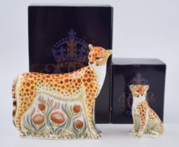 Two Royal Crown Derby paperweights, Cheetah, 14cm high and Cheetah Cub, 7.7cm, gold stoppers, red