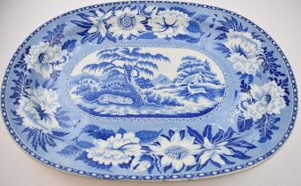 An early 19th century blue and white transfer-printed Leopard and Antelope pattern large platter, c.