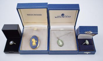 Wedgwood jewellery to include a gold on blue cameo brooch in gilt frame, a gold on silver ring