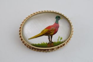 ‘Essex crystal’ type gold mounted brooch depicting a male pheasant (mount tested as 9ct gold),