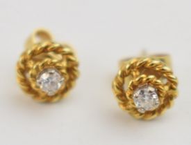 A pair of 9ct gold ornate earrings, set with diamonds, 1.7 grams.