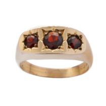 9ct gold gypsy ring set with 3 garnets, size Y/Z, 6.4 grams.