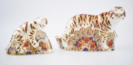 Two Royal Crown Derby paperweights, Bengal Tiger, H:13cm and a Bengal Tiger Cub, H:10cm, red printed