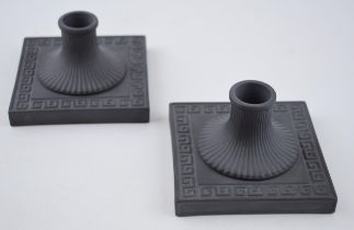 A pair of Wedgwood black basalt square candlesticks, neoclassical design, 10.5cm wide (2). In good