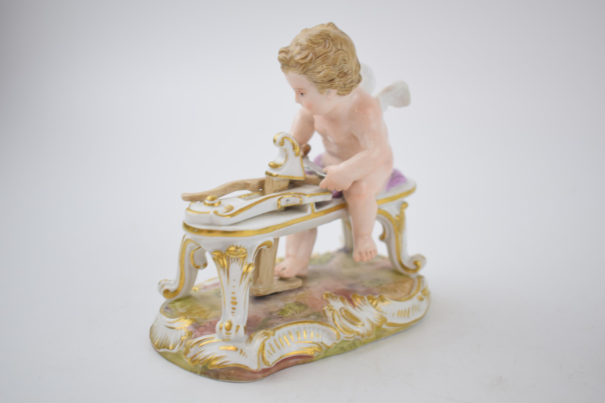 Early 20th century Meissen figure 'Cupid Carving His Bow', 11cm wide, with incised marks, together - Image 3 of 7