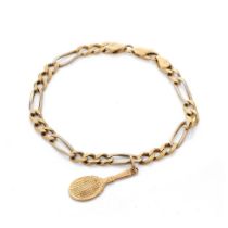 An 18ct yellow gold figaro bracelet marked .750 with a tennis racket charm. Length approx 19cm.